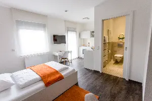 Studio – Boxspringbett mit Küchenzeile und Bad | Boardinghouse Offenbach