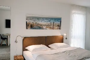 Studio X-Large – double bed with reading lamps | Boardinghouse Obertshausen